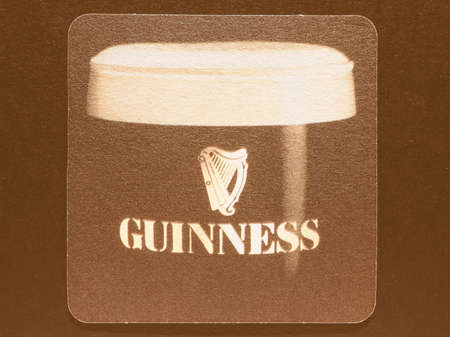 DUBLIN, IRELAND - DECEMBER 11, 2014: Beermat of Irish beer Guinness vintageのeditorial素材