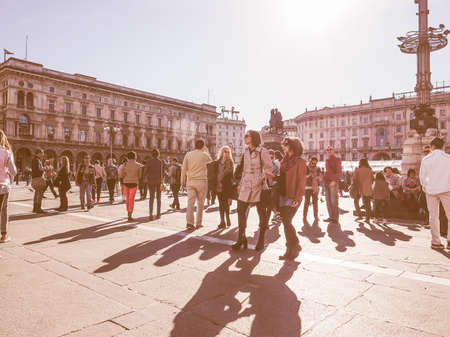 MILAN, ITALY - MARCH 28, 2015: Tourists in the Piazza Duomo square in front of Milan Cathedral church vintageのeditorial素材