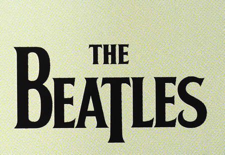 LONDON, UK - CIRCA APRIL 2016: Logo of British band The Beatles printed on a cdのeditorial素材