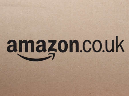 SEATTLE, USA - CIRCA APRIL 2016: Logo of online retailer Amazon on a corrugated cardboard packet used for worldwide shippingのeditorial素材