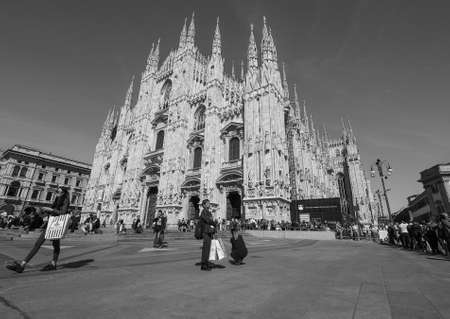 MILAN, ITALY - CIRCA APRIL 2016: Tourists in Piazza Duomo (meaning Cathedral Square) in black and whiteのeditorial素材