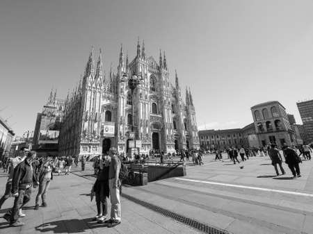 MILAN, ITALY - CIRCA APRIL 2016: Tourists in Piazza Duomo (meaning Cathedral Square) in black and whiteのeditorial素材