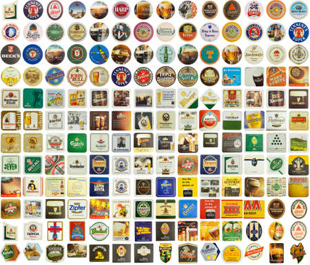 LONDON, UK - CIRCA MAY 2016: Beermats of many different beers from main European and world countries including United Kingdom, Germany, Belgium, Ireland, Italy, Austria, England, Scotlandのeditorial素材