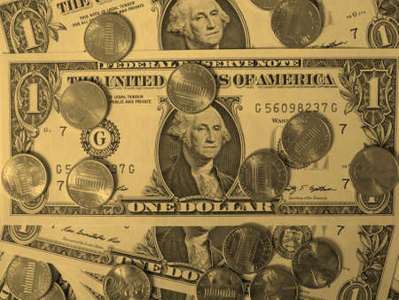 One cent coins and One Dollar banknotes  currency of the United States useful as a background -...