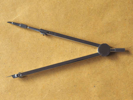 Compass technical drawing instrument that used for inscribing circles or arcs on paperの写真素材