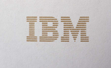 NEW YORK, USA - CIRCA MAY 2016: Logo of International Business Machines Corporation, aka IBM, printed in golden ink on paperのeditorial素材