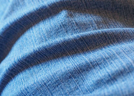 Blue jeans aka denim fabric useful as a backgroundの写真素材