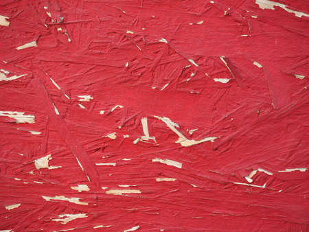 Red composite wood useful as a backgroundの写真素材