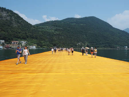 LAKE ISEO, ITALY - CIRCA JUNE 2016: The Floating Piers site specific landscape artwork by Christo and Jeanne Claudeのeditorial素材