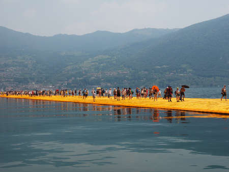 LAKE ISEO, ITALY - CIRCA JUNE 2016: The Floating Piers site specific landscape artwork by Christo and Jeanne Claudeのeditorial素材
