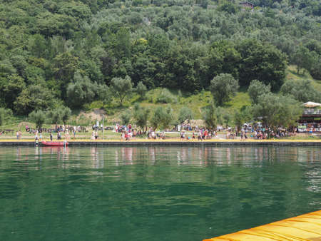 LAKE ISEO, ITALY - CIRCA JUNE 2016: The Floating Piers site specific landscape artwork by Christo and Jeanne Claudeのeditorial素材