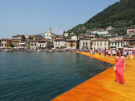 LAKE ISEO, ITALY - CIRCA JUNE 2016: The Floating Piers site specific landscape artwork by Christo and Jeanne Claudeのeditorial素材