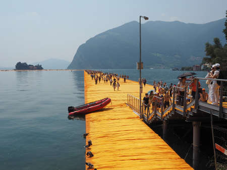 LAKE ISEO, ITALY - CIRCA JUNE 2016: The Floating Piers site specific landscape artwork by Christo and Jeanne Claudeのeditorial素材