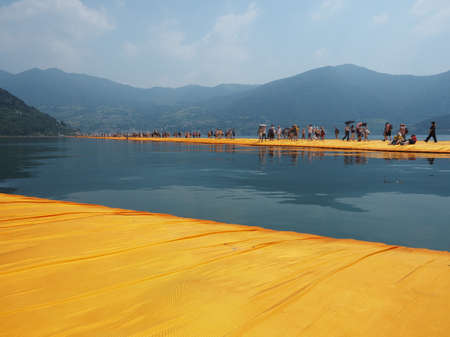 LAKE ISEO, ITALY - CIRCA JUNE 2016: The Floating Piers site specific landscape artwork by Christo and Jeanne Claudeのeditorial素材