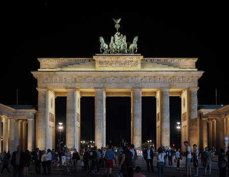BERLIN, GERMANY - CIRCA JUNE 2016: Tourists at Brandenburger Tor (meaning Brandenburg Gate) at nightのeditorial素材