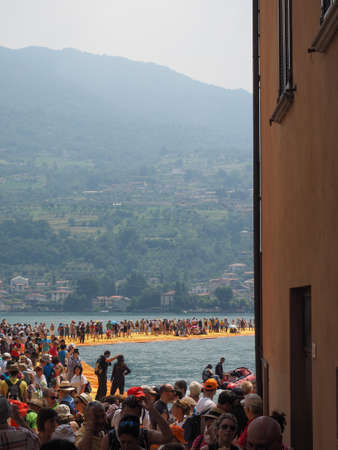 LAKE ISEO, ITALY - CIRCA JUNE 2016: The Floating Piers site specific landscape artwork by Christo and Jeanne Claudeのeditorial素材