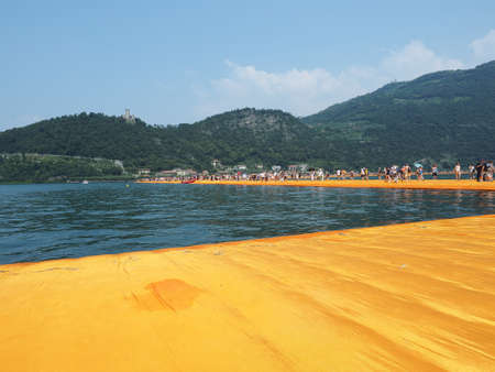 LAKE ISEO, ITALY - CIRCA JUNE 2016: The Floating Piers site specific landscape artwork by Christo and Jeanne Claudeのeditorial素材