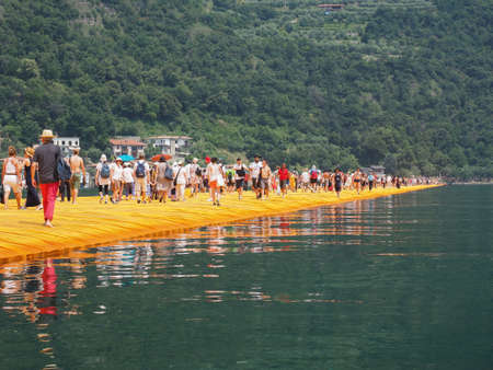 LAKE ISEO, ITALY - CIRCA JUNE 2016: The Floating Piers site specific landscape artwork by Christo and Jeanne Claudeのeditorial素材