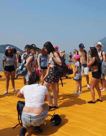 LAKE ISEO, ITALY - CIRCA JUNE 2016: The Floating Piers site specific landscape artwork by Christo and Jeanne Claudeのeditorial素材