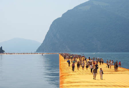 LAKE ISEO, ITALY - CIRCA JUNE 2016: The Floating Piers site specific landscape artwork by Christo and Jeanne Claudeのeditorial素材
