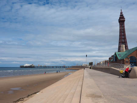 BLACKPOOL, UK - CIRCA JUNE 2016: Blackpool Pleasure Beach resort and Blackpool Tower on the Fylde coast in Lancashireのeditorial素材