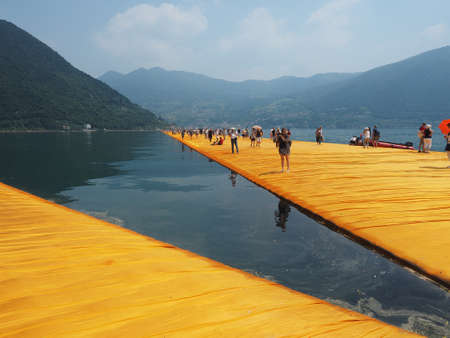 LAKE ISEO, ITALY - CIRCA JUNE 2016: The Floating Piers site specific landscape artwork by Christo and Jeanne Claudeのeditorial素材