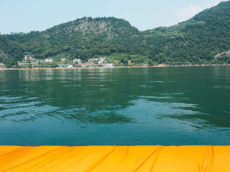 LAKE ISEO, ITALY - CIRCA JUNE 2016: The Floating Piers site specific landscape artwork by Christo and Jeanne Claudeのeditorial素材