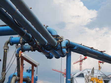 Blue water pipes used to pump water away from buildings foundations are now a city landmark in...