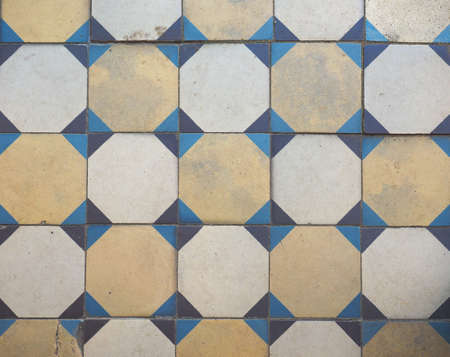 Vintage tiled stone floor useful as a background
