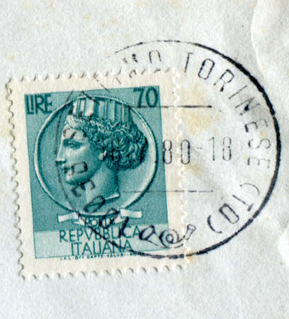 SETTIMO TORINESE, ITALY - CIRCA JULY 2016: A stamp printed by Italy shows the Repubblica Italiana (meaning Italian Republic) represented as a womanのeditorial素材
