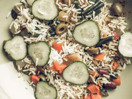 Vintage desaturated Curry rice with season vegetables vegetarian Indian foodの写真素材