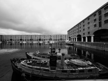 LIVERPOOL, UK - CIRCA JUNE 2016: The Albert Dock complex of dock buildings and warehouses in black...