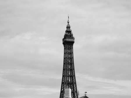 BLACKPOOL, UK - CIRCA JUNE 2016: Blackpool Tower on Blackpool Pleasure Beach resort amusement park on the Fylde coast in black and whiteのeditorial素材