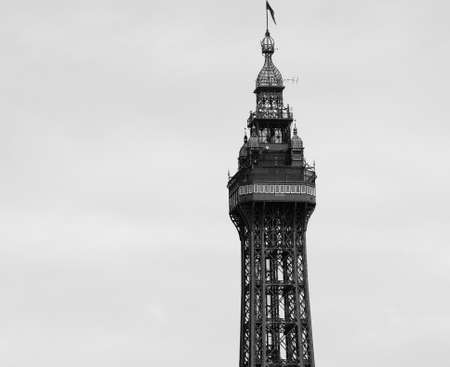 BLACKPOOL, UK - CIRCA JUNE 2016: Blackpool Tower on Blackpool Pleasure Beach resort amusement park on the Fylde coast in black and whiteのeditorial素材