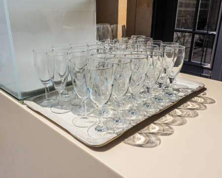 High dynamic range (HDR) Many champagne glasses at outdoor alfresco bar High dynamic range (HDR) Many champagne glasses at outdoor alfresco bar