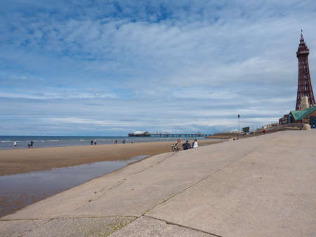BLACKPOOL, UK - CIRCA JUNE 2016: Blackpool Pleasure Beach resort and Blackpool Tower on the Fylde coast in Lancashireのeditorial素材