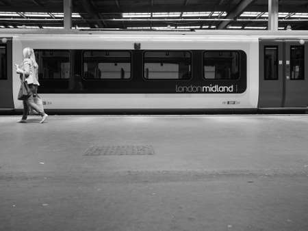 LONDON, UK - CIRCA JUNE 2016: London Midland train at London Euston train station in black and whiteのeditorial素材