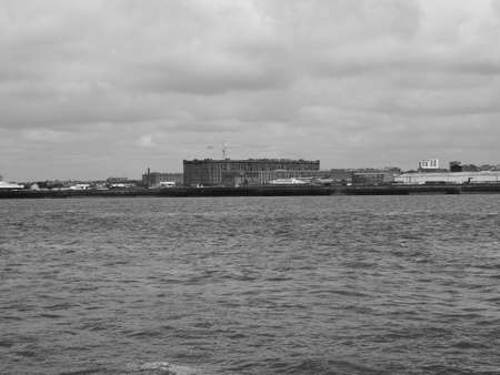 LIVERPOOL, UK - CIRCA JUNE 2016: Skyline view of the waterfront on River Mersey in black and whiteのeditorial素材