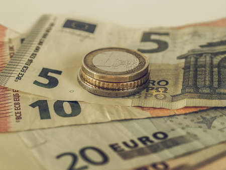 Vintage looking Euro coins and banknotes currency of the European Unionの写真素材