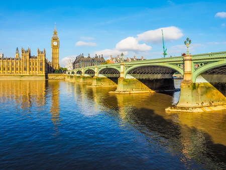 LONDON, UK - SEPTEMBER 28, 2015: Tourists on Westminster Bridge at the Houses of Parliament aka Westminster Palace (HDR)のeditorial素材