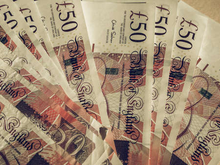 Vintage looking Fifty British Pound banknotes currency of the United Kingdomの写真素材