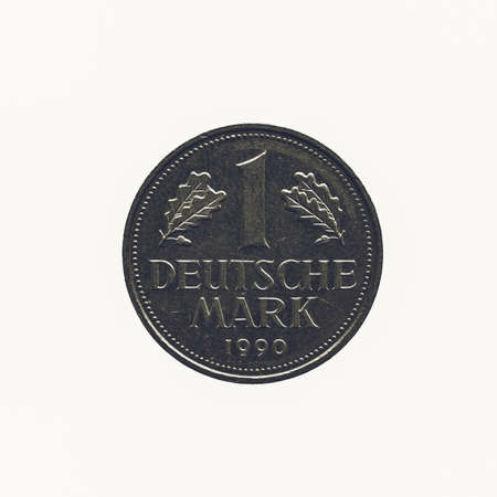 Vintage looking One Deutsche mark coin isolated over a white backgroundの写真素材