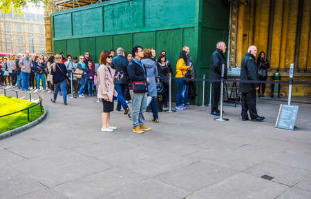 LONDON, UK - SEPTEMBER 28, 2015: Tourists visiting central London (HDR)のeditorial素材