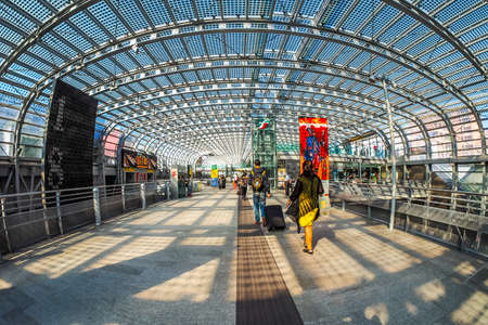 TURIN, ITALY - CIRCA SEPTEMBER, 2015: Travellers in Torino Porta Susa railway station which is the main central station seen with fisheye lens (HDR)のeditorial素材