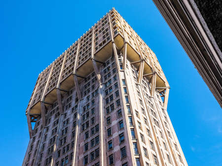 MILAN, ITALY - MARCH 28, 2015: The Torre Velasca designed in 1955 by BBPR is a masterpiece of Italian new brutalist architecture (HDR)のeditorial素材