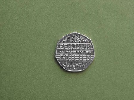 LONDON, UK - CIRCA AUGUST 2016: Celebratory 50 pence coin for hundred years anniversary of British composer Benjamin Britten birthのeditorial素材