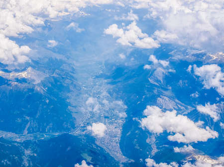 High dynamic range HDR Aerial view of a valley in Alps mountainsの写真素材