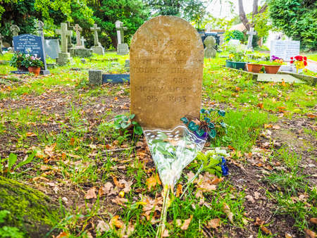 TANWORTH IN ARDEN, UK - SEPTEMBER 25, 2015: Grave of English musician Nick Drake in the churchyard of St Mary Magdalene church (HDR)のeditorial素材