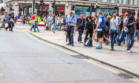 Travellers at Oxford Circus underground station in London, UK (HDR)