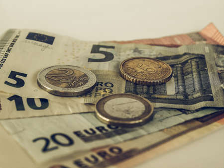 Vintage looking Euro coins and banknotes currency of the European Unionの写真素材
